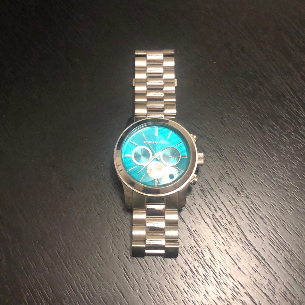 Silver with teal face MK watch